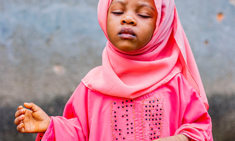 Little Girl in Pink Abaya Dress and Hijab Headscarf .pexels