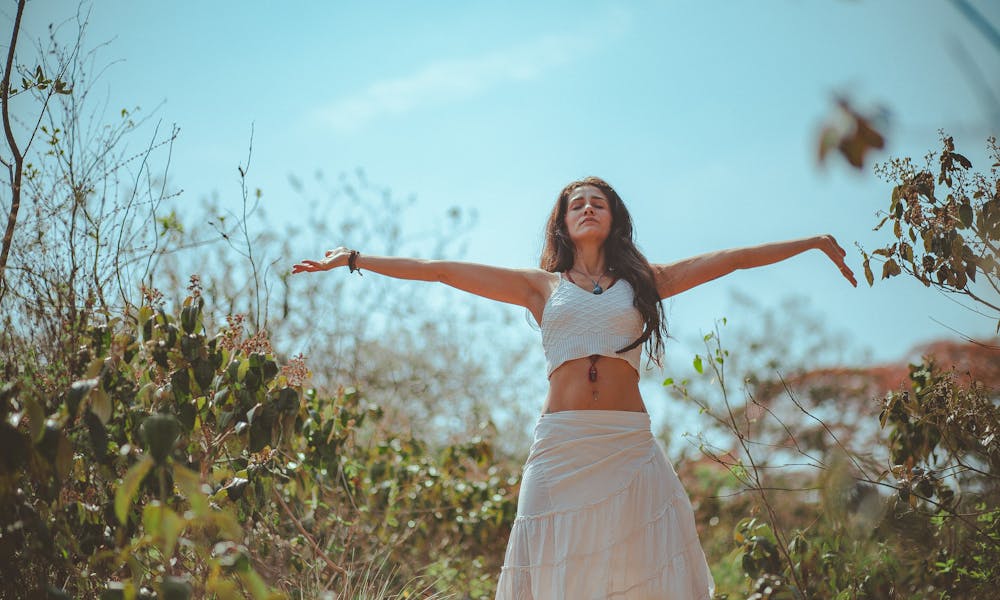 Woman Spreading Both Her Arms .pexels