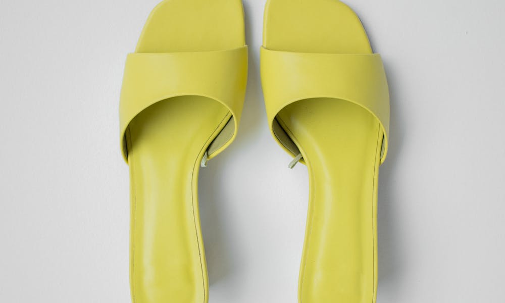 Stylish neon yellow square toe feminine shoes .pexels