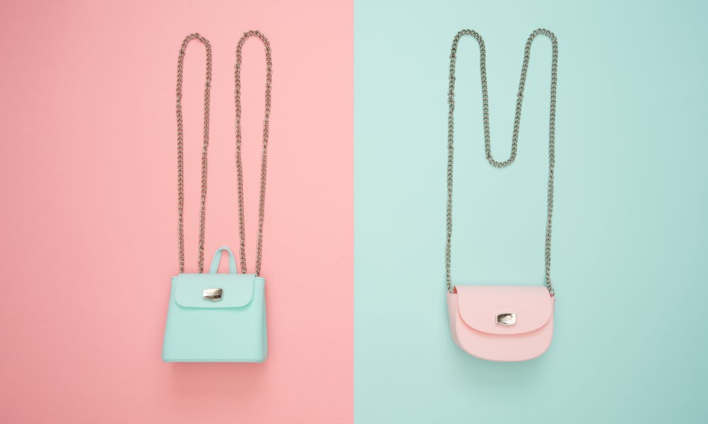 Photo of Two Teal and Pink Leather Crossbody Bags .pexels