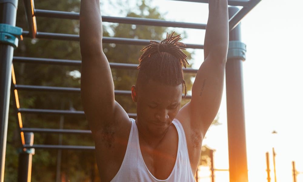 Man in Tank Top  .pexels
