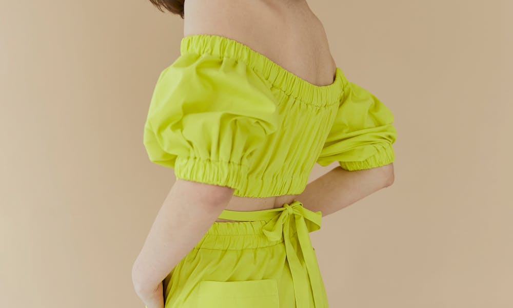 Young Brunette in a Matching Set of Summer Clothing  .pexels