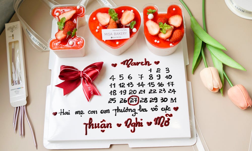 A calendar with strawberries and a heart on it .pexels