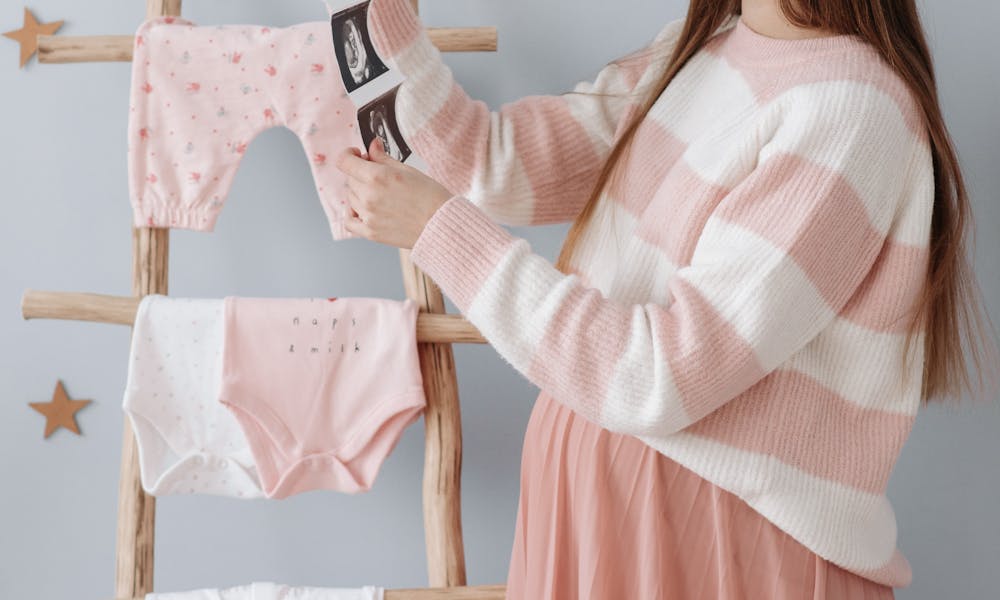 A Woman Looking at Her Ultrasound Result .pexels