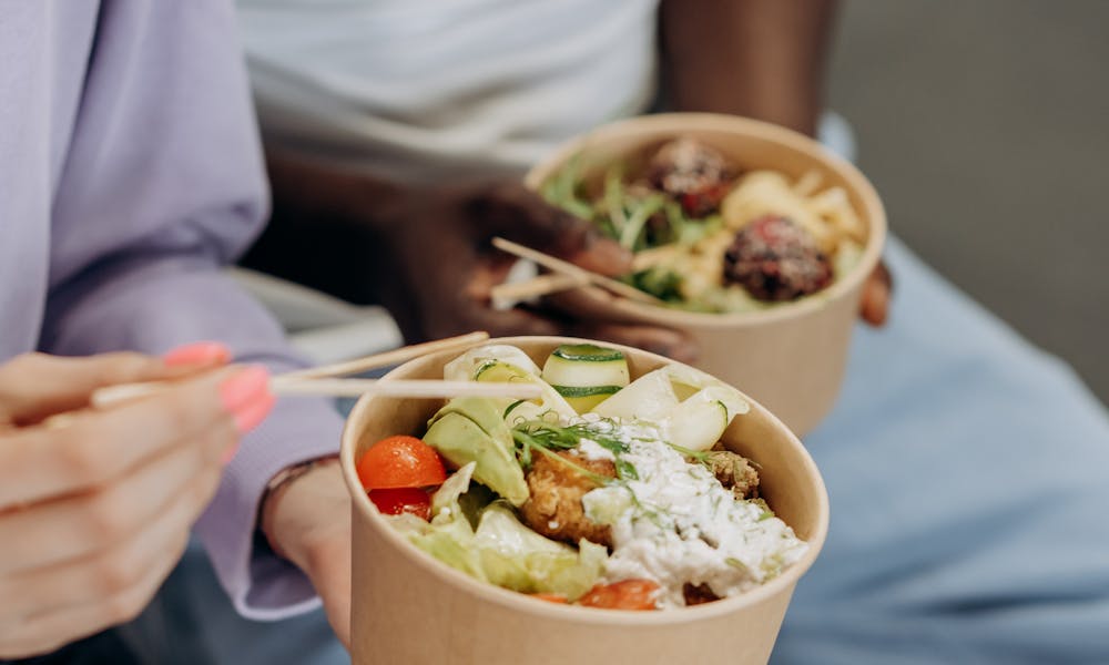 Two People Eating Healthy Food In Bowls .pexels