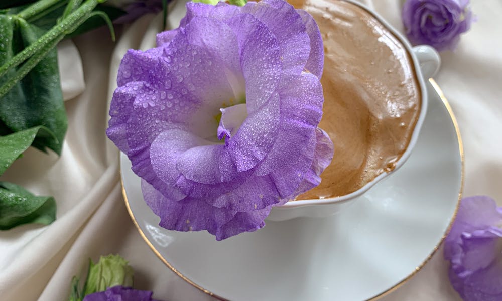 Cup of Coffee with Purple Flower .pexels