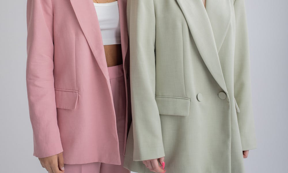 Women in trendy blazers in studio .pexels