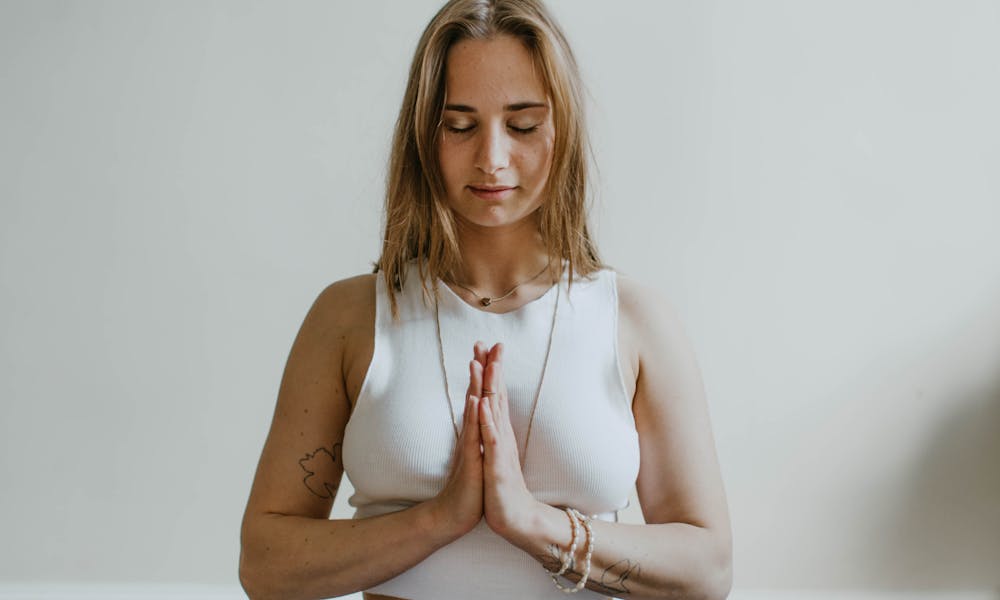 Woman Doing Yoga Inside A Room .pexels