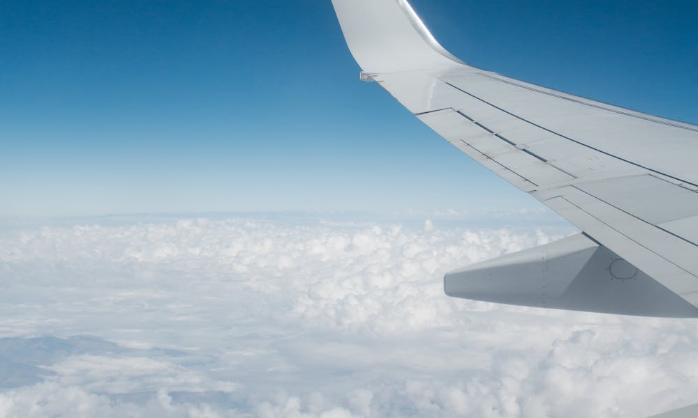 White Airplane over the White Sky .pexels