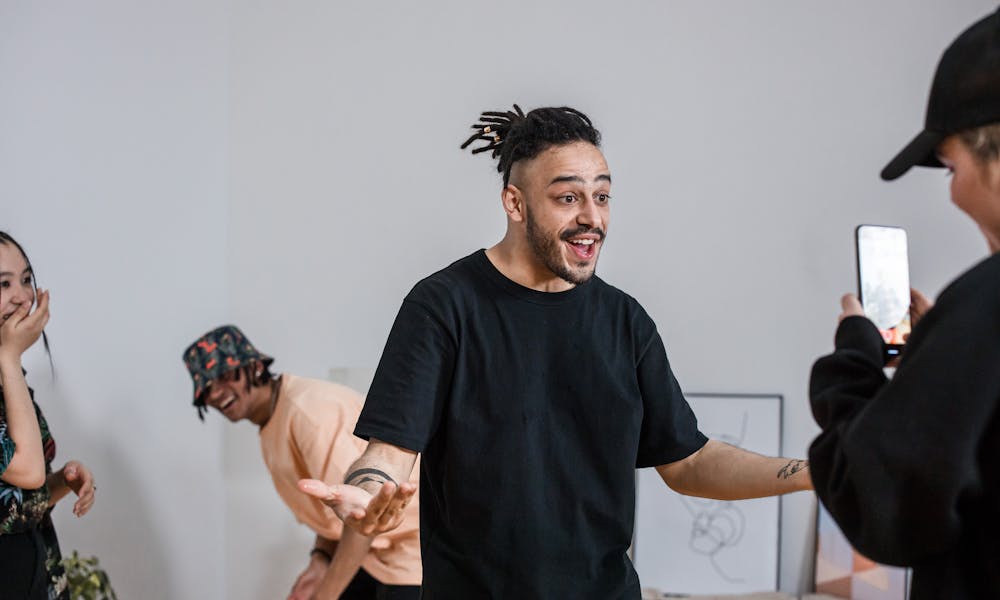 A Man Being Recorded for a Video .pexels