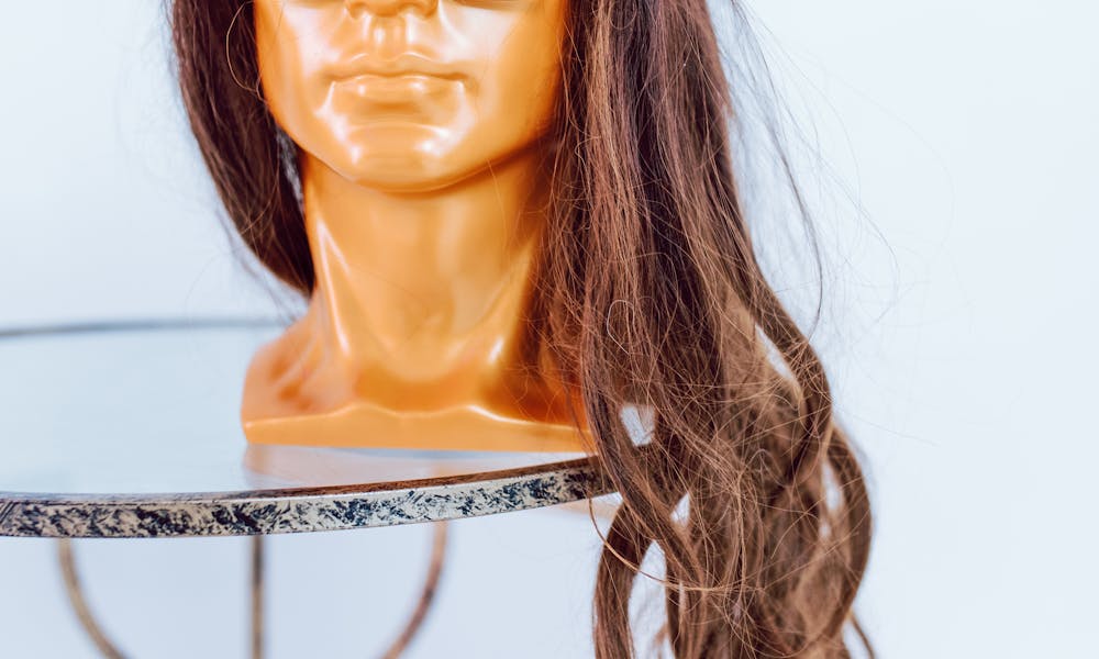 Woman in Black Sunglasses and White Shirt .pexels