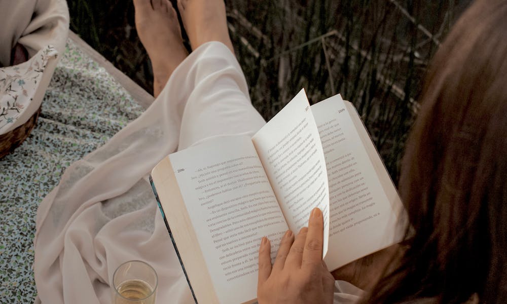 Woman Reading a Book .pexels