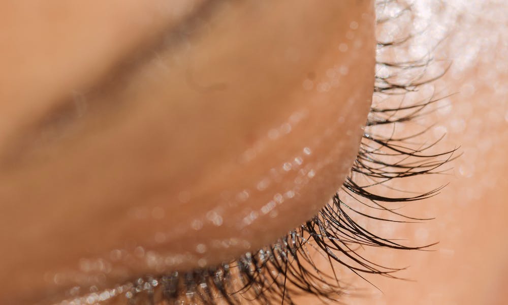 Closed eye of anonymous woman .pexels