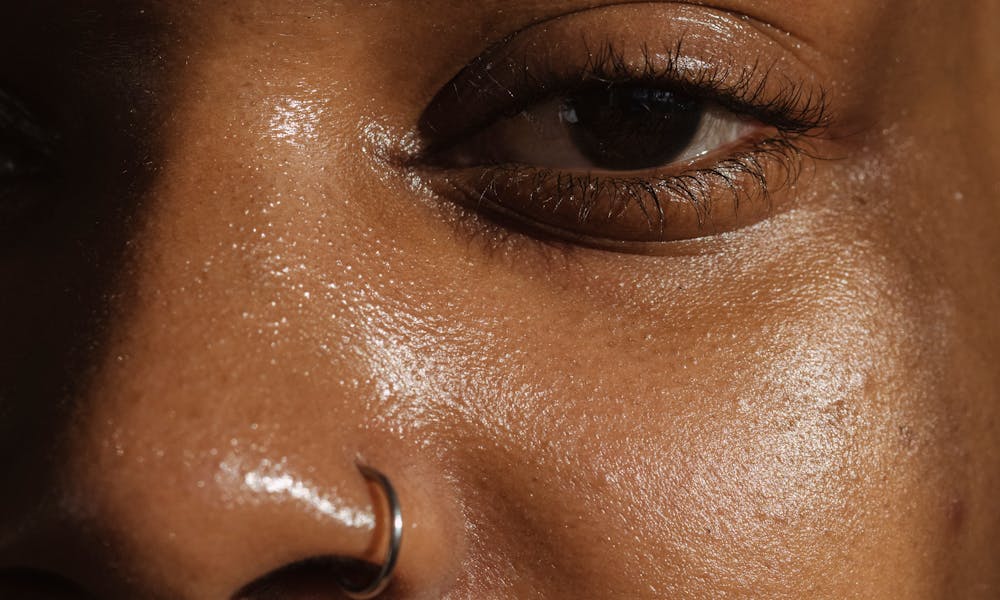 Close Up Shot of a Person's Face .pexels