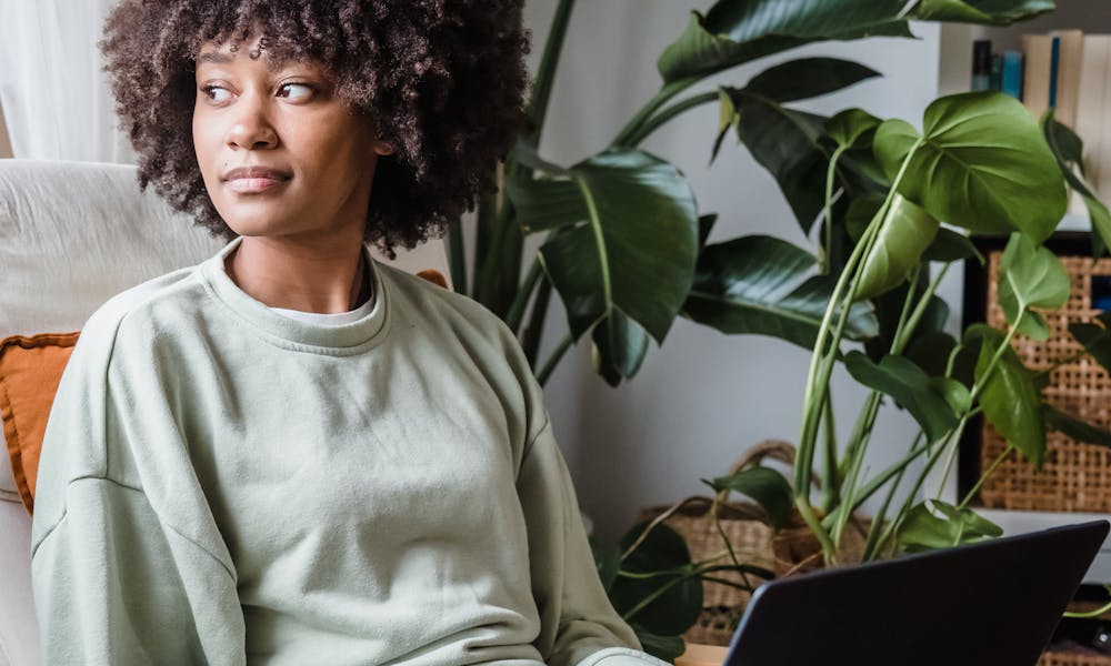 Woman Sitting on Chair with Laptop .pexels