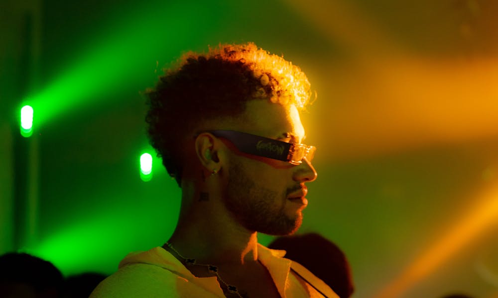 Trendy Man in Neon Lit Club Scene .pexels