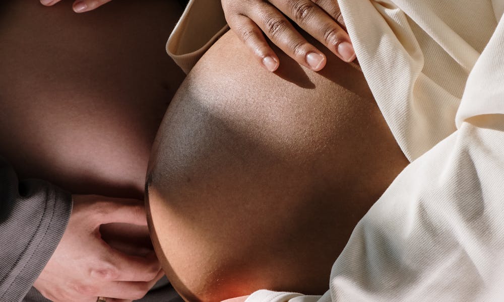 A Close-Up Shot of Pregnant Women .pexels