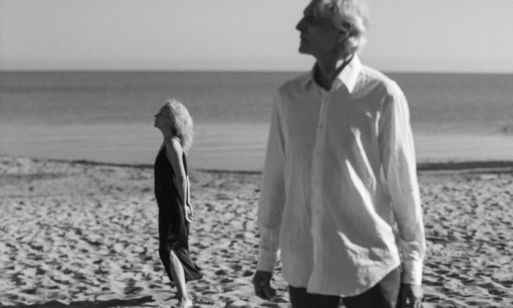 Grayscale Photo of an Old Couple on the Beach .pexels