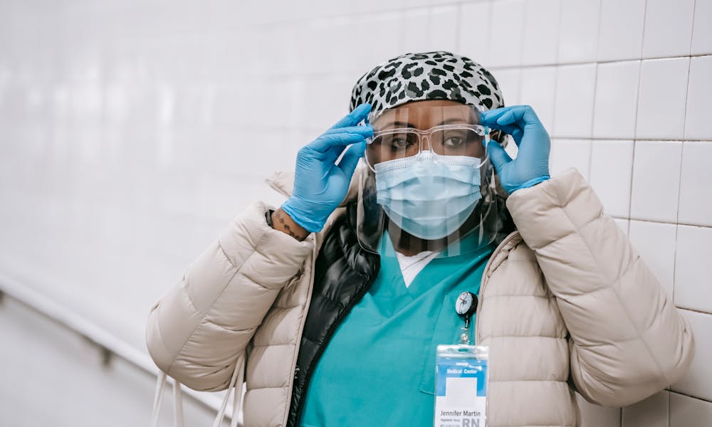 Concentrated African American woman in protective apparel .pexels