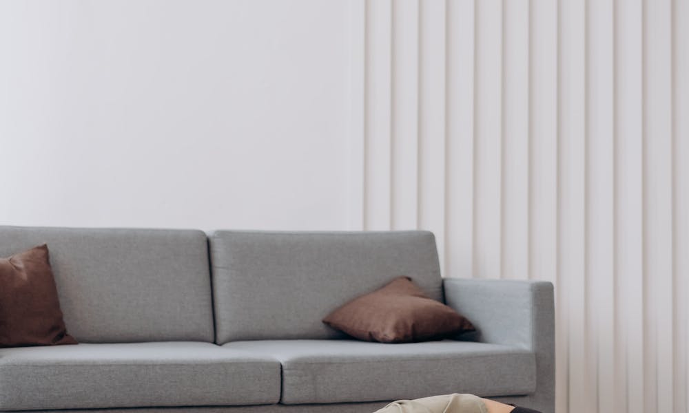 Woman in Brown Shirt In A Bending Position .pexels