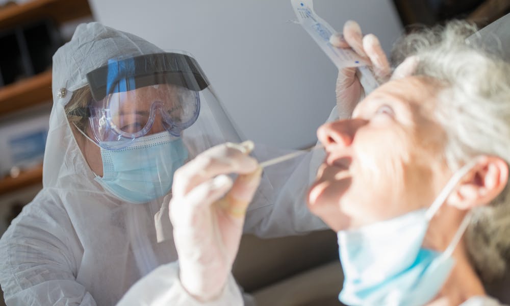 Doctor Making Covid Test .pexels