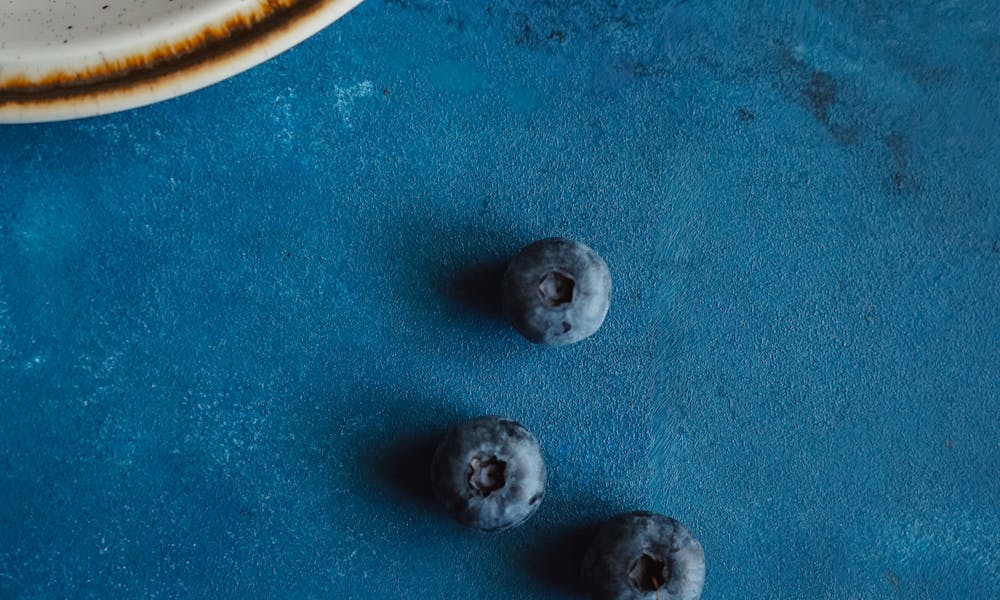 Blueberries on Blue Background .pexels