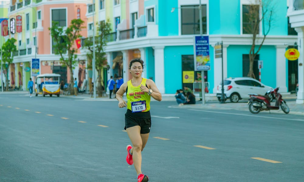 Marathon runner competing in vibrant Hải Phòng, showcasing determination and endurance. .pexels